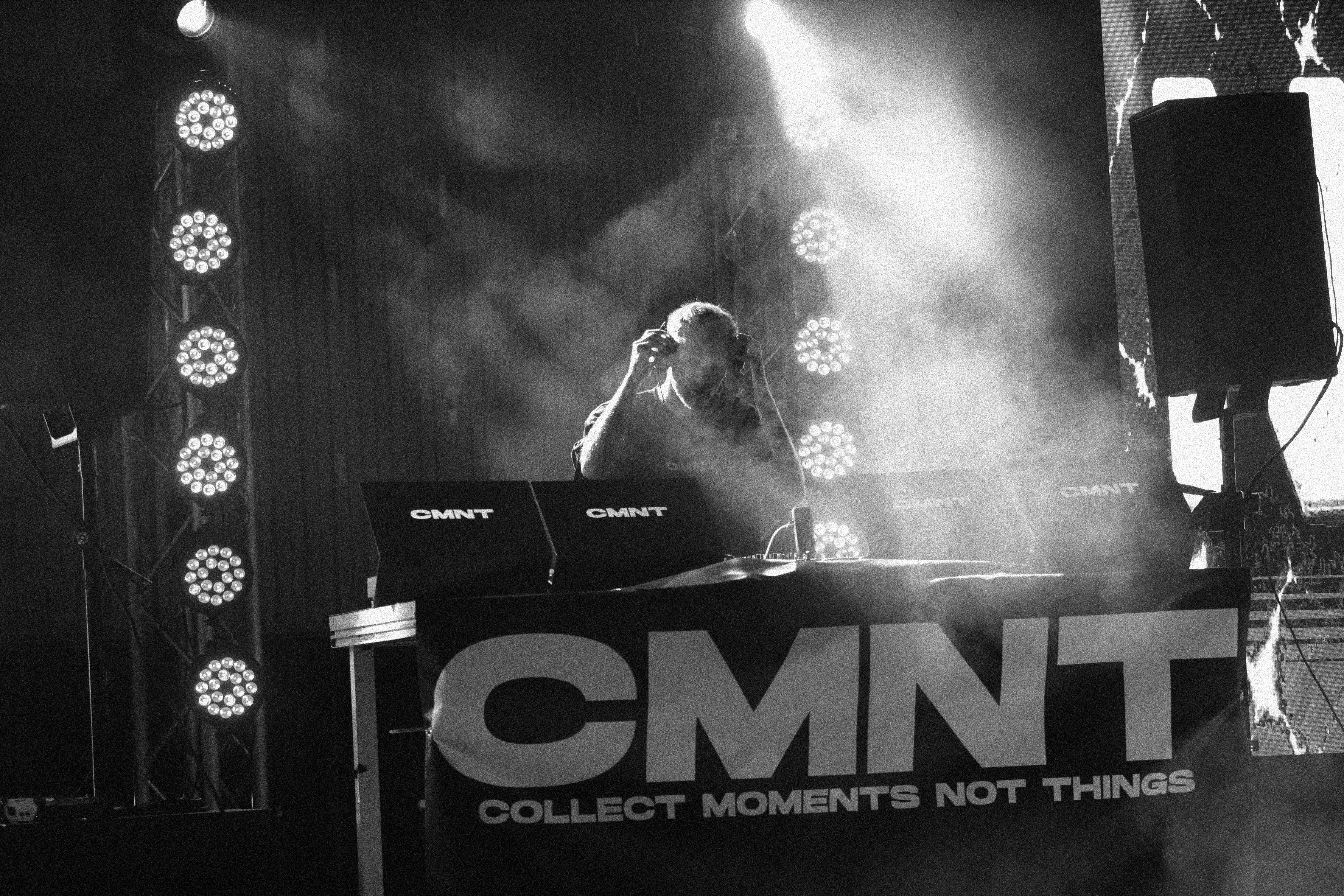 Close view of hands mixing on a DJ console